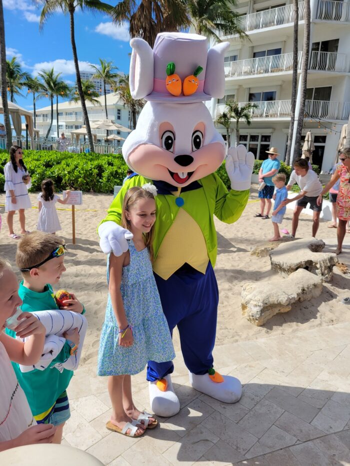 Easter 2024 at Lago Mar easter bunny posing with child during hunt